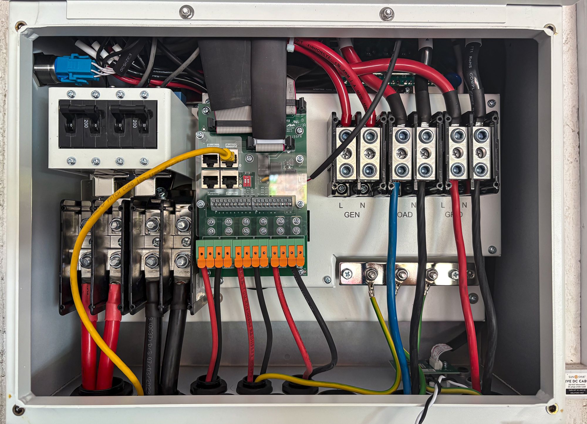 Electrical control panel with wiring and breakers
