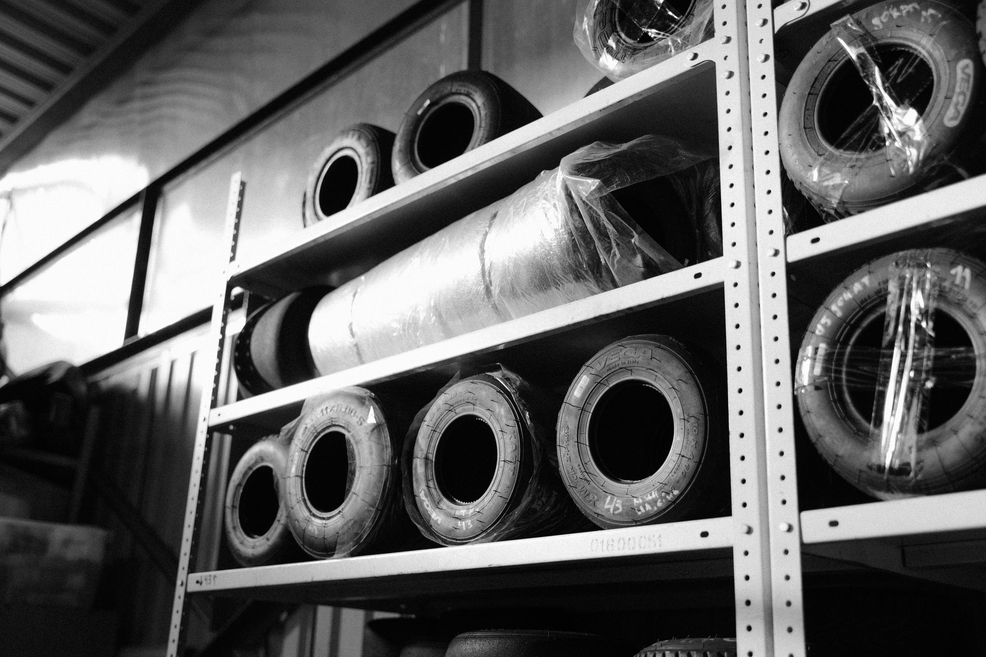 Maintenance spare parts stored on industrial shelving