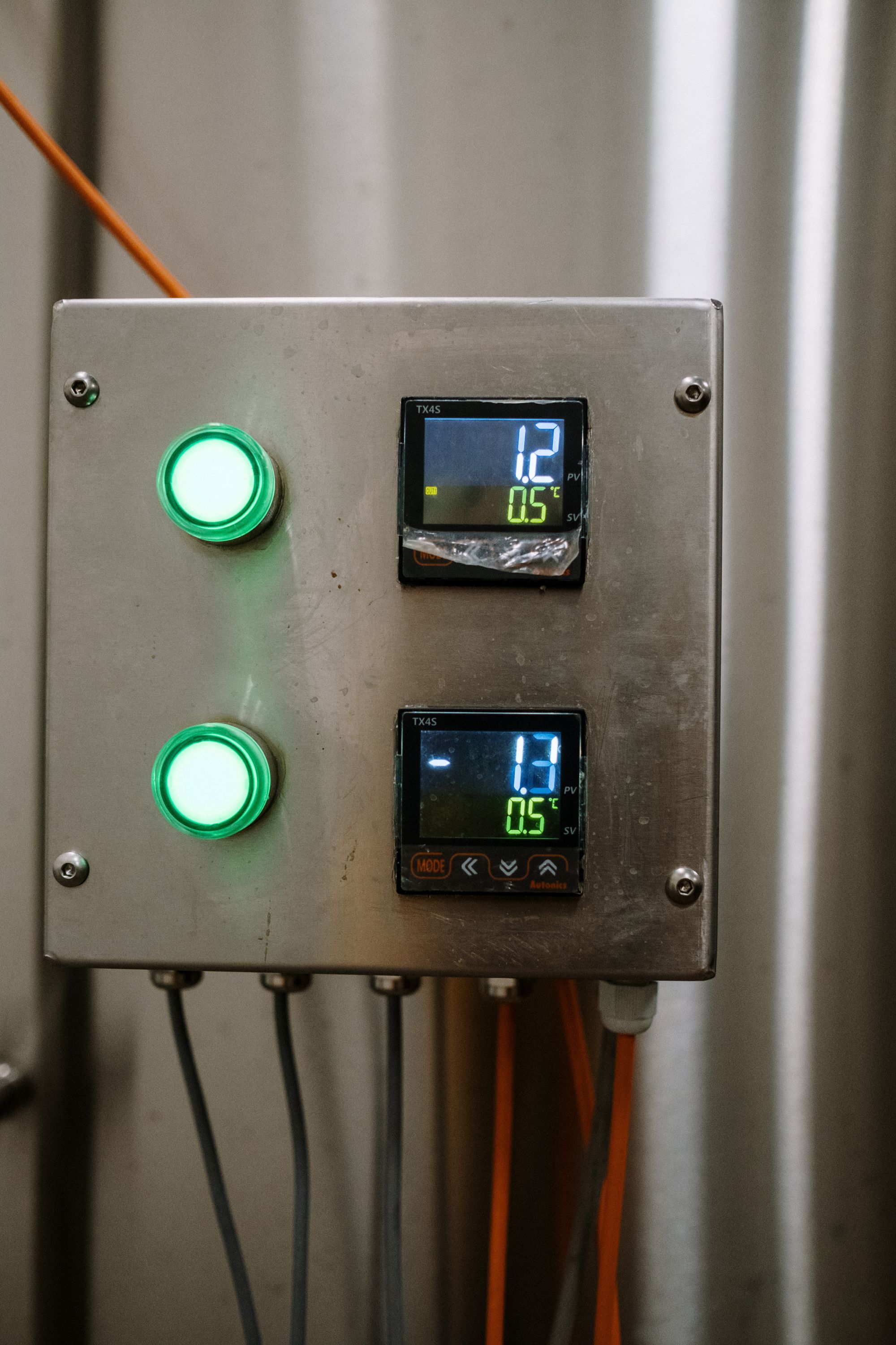 Illuminated indicator sensors on industrial machinery