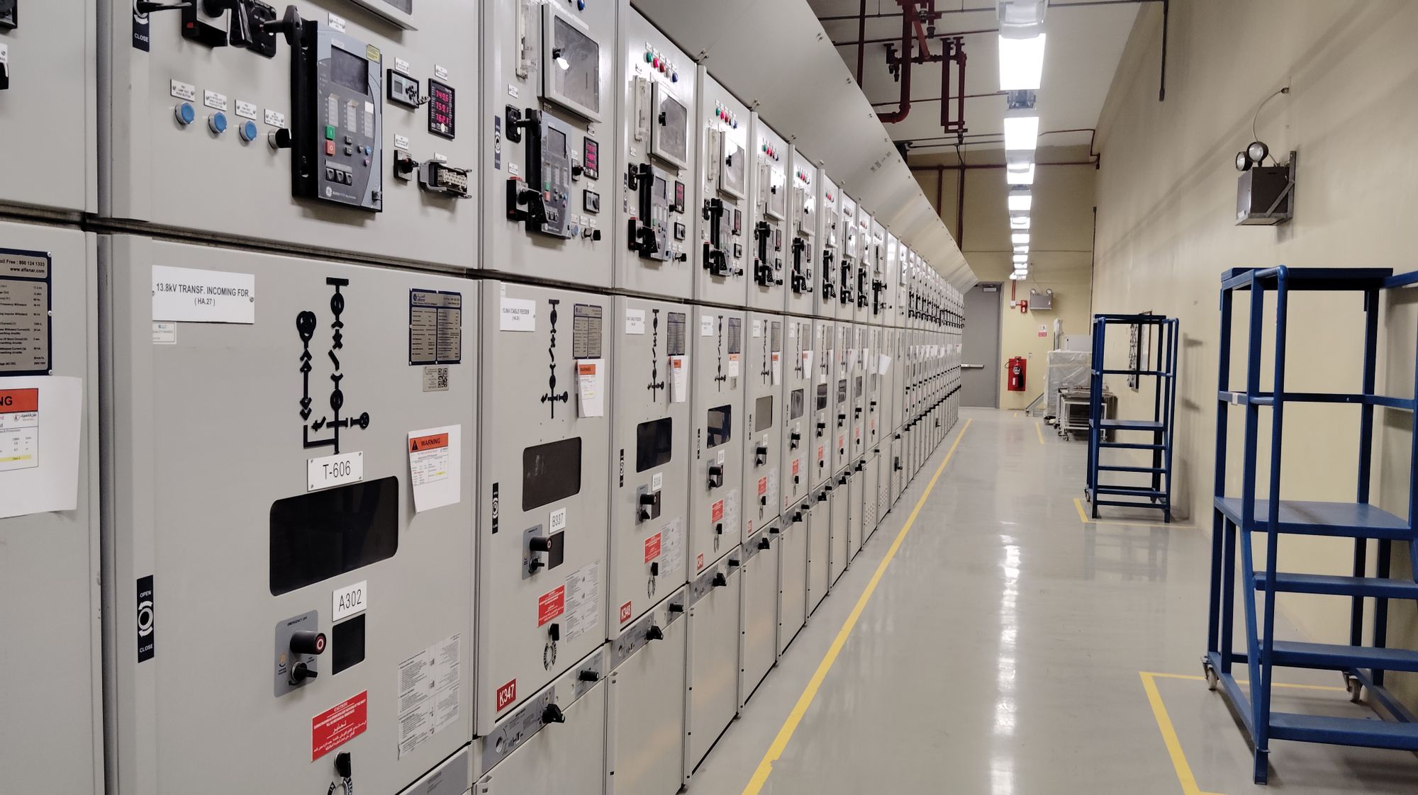 Row of switchgear cabinets in a substation hall