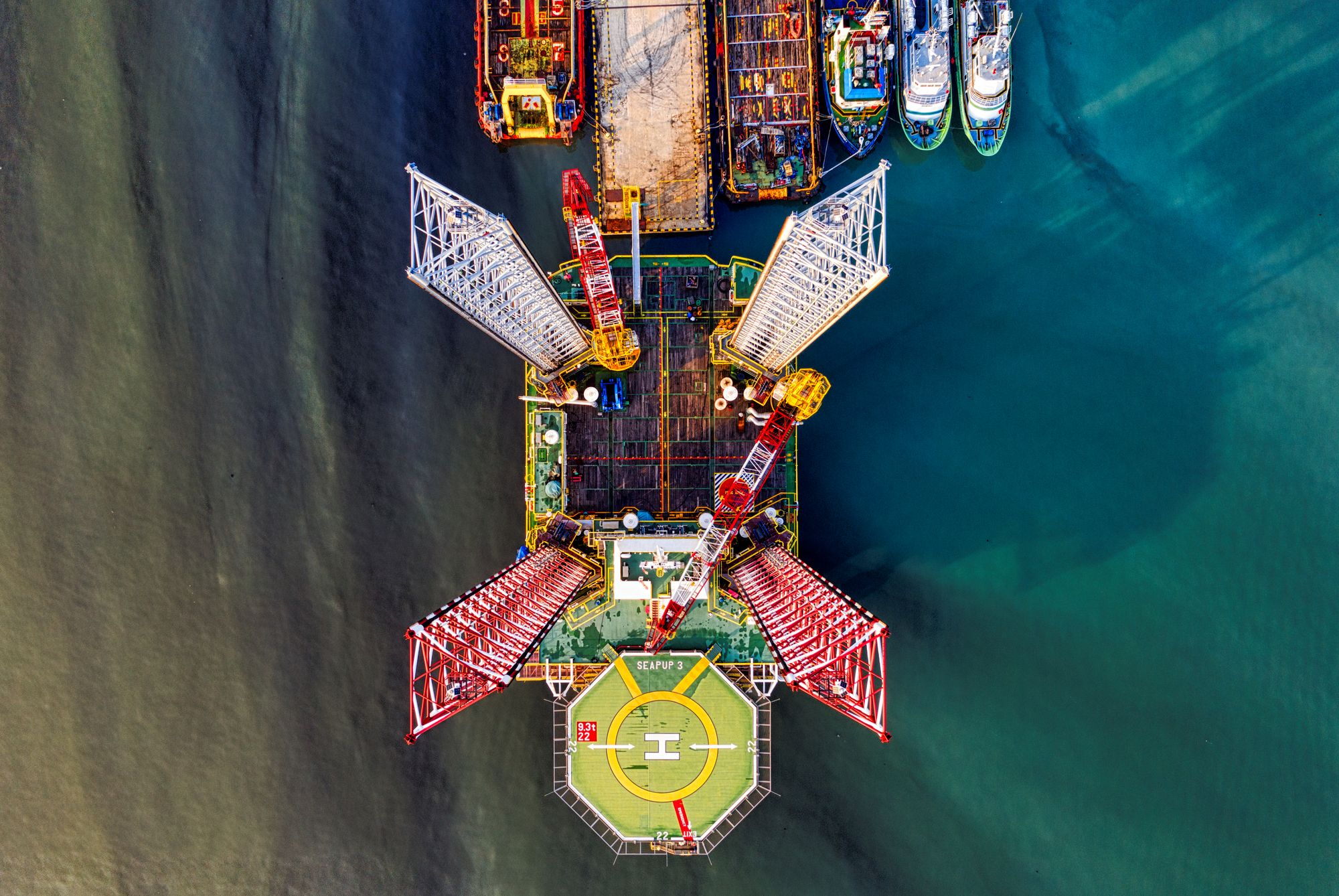 Aerial view of an offshore platform in open water